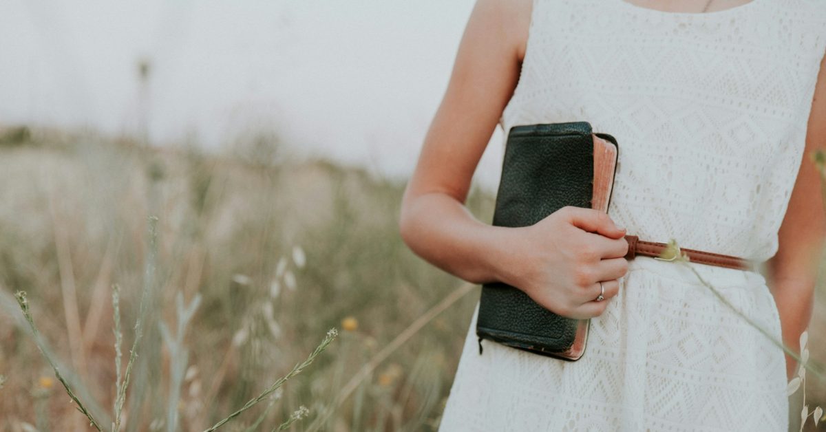 Holding a Bible